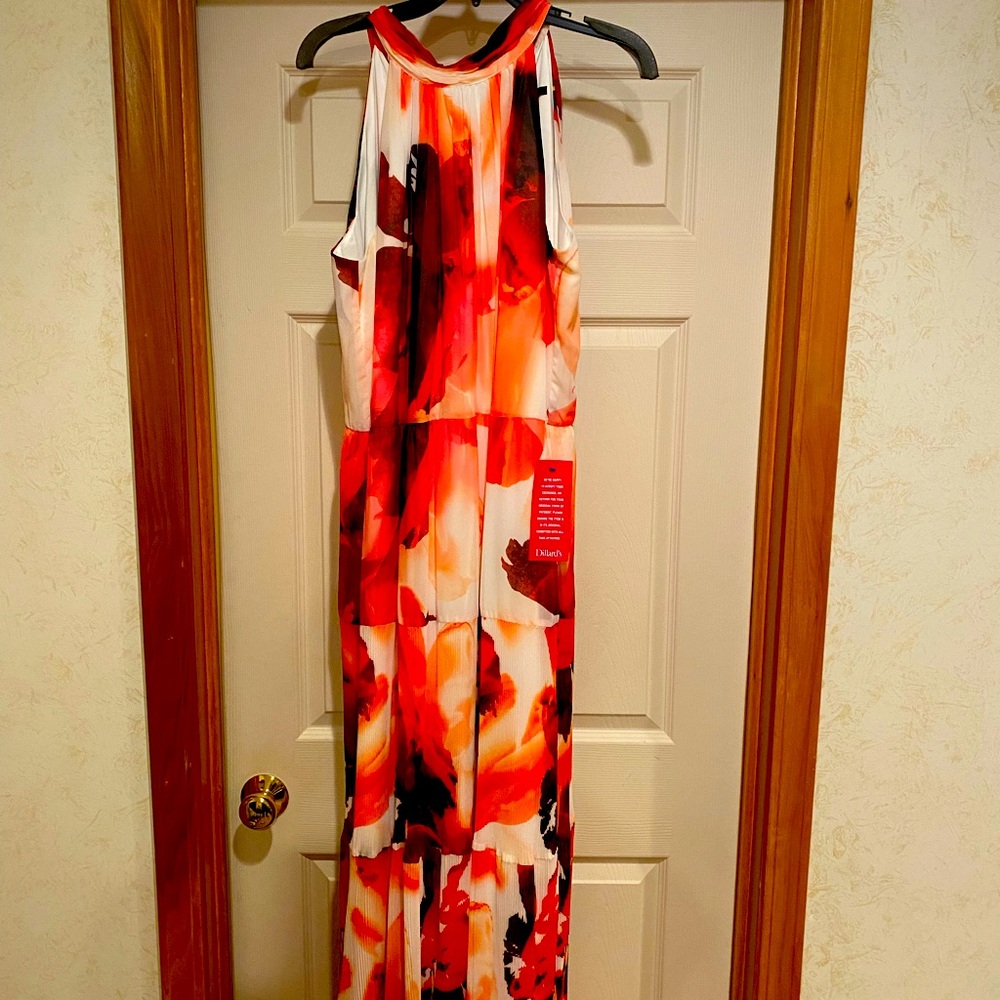 Maxi sleeveless multi colored dress. Ties around the neck in back
